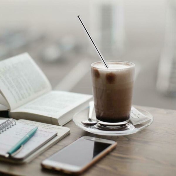 Our reusable straw, minus the plastic, in a cold coffee drink,